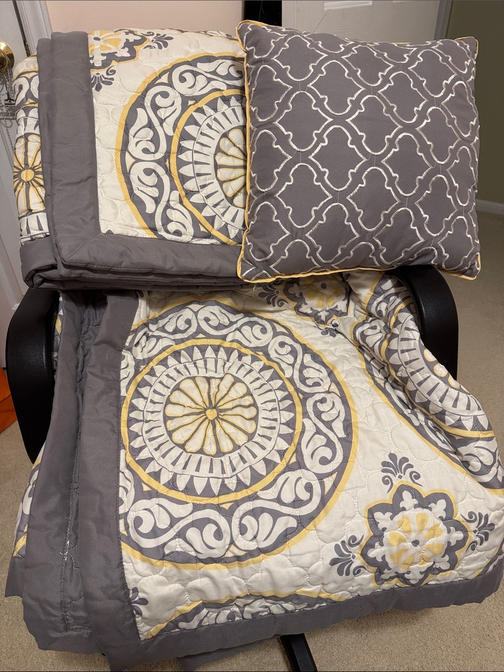 Gray and yellow quilted bedspread with 2 matching shams and 1 throw pillow